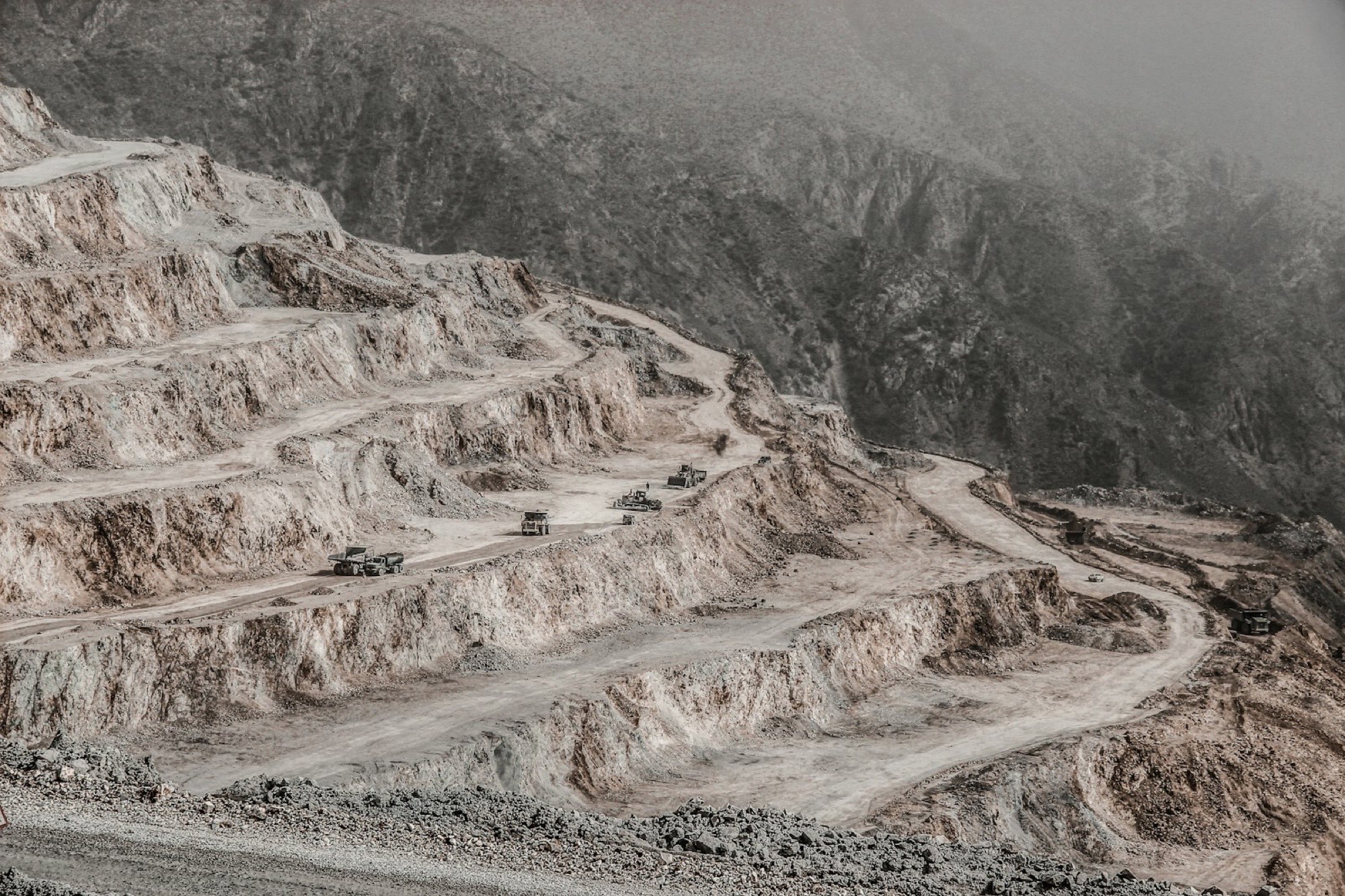 Open-pit viewpoint over an active mega-mine near Kolwezi at dusk